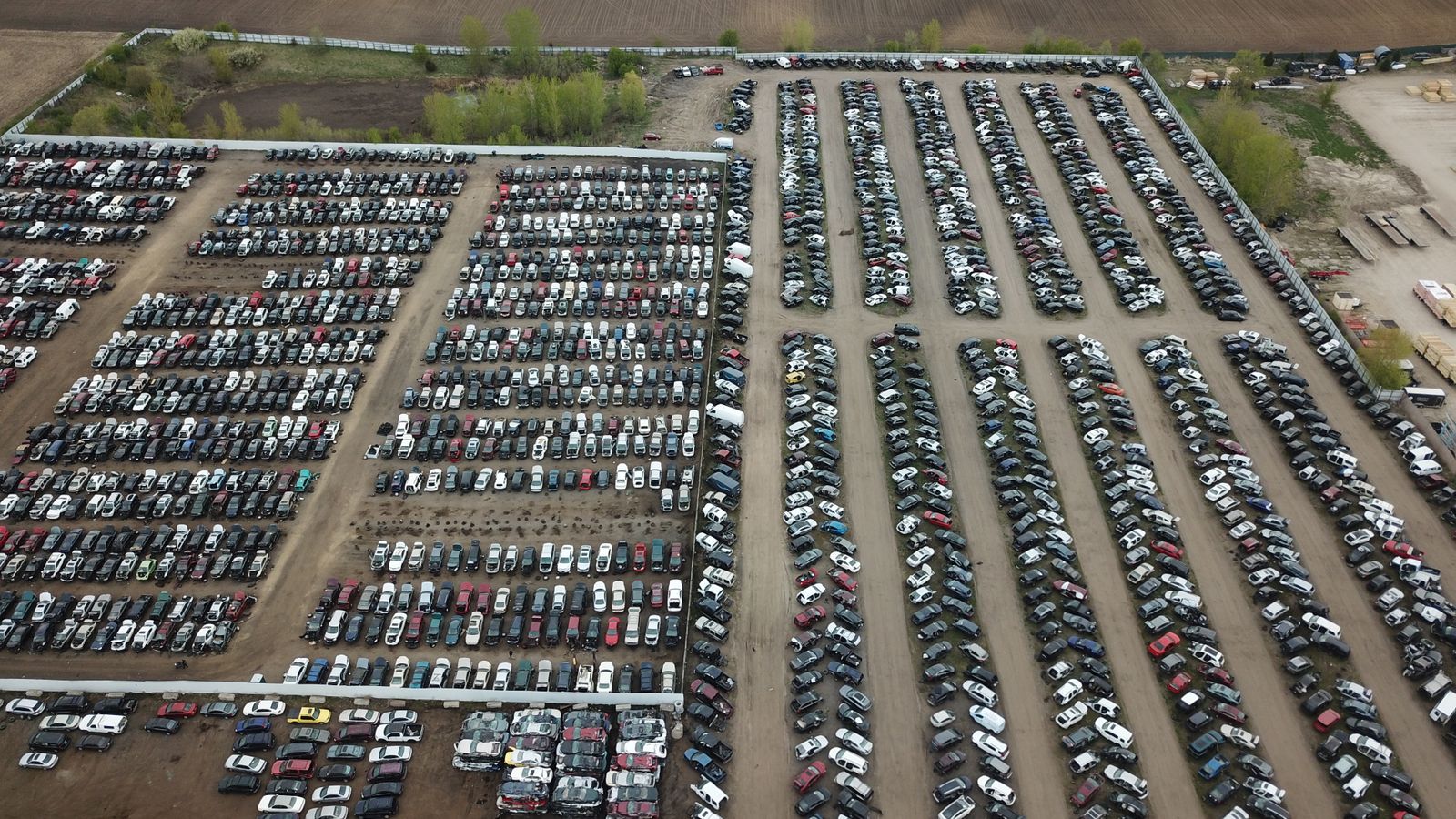 Aerial shot of a large vehicle storage or junkyard in Minnesota, USA.